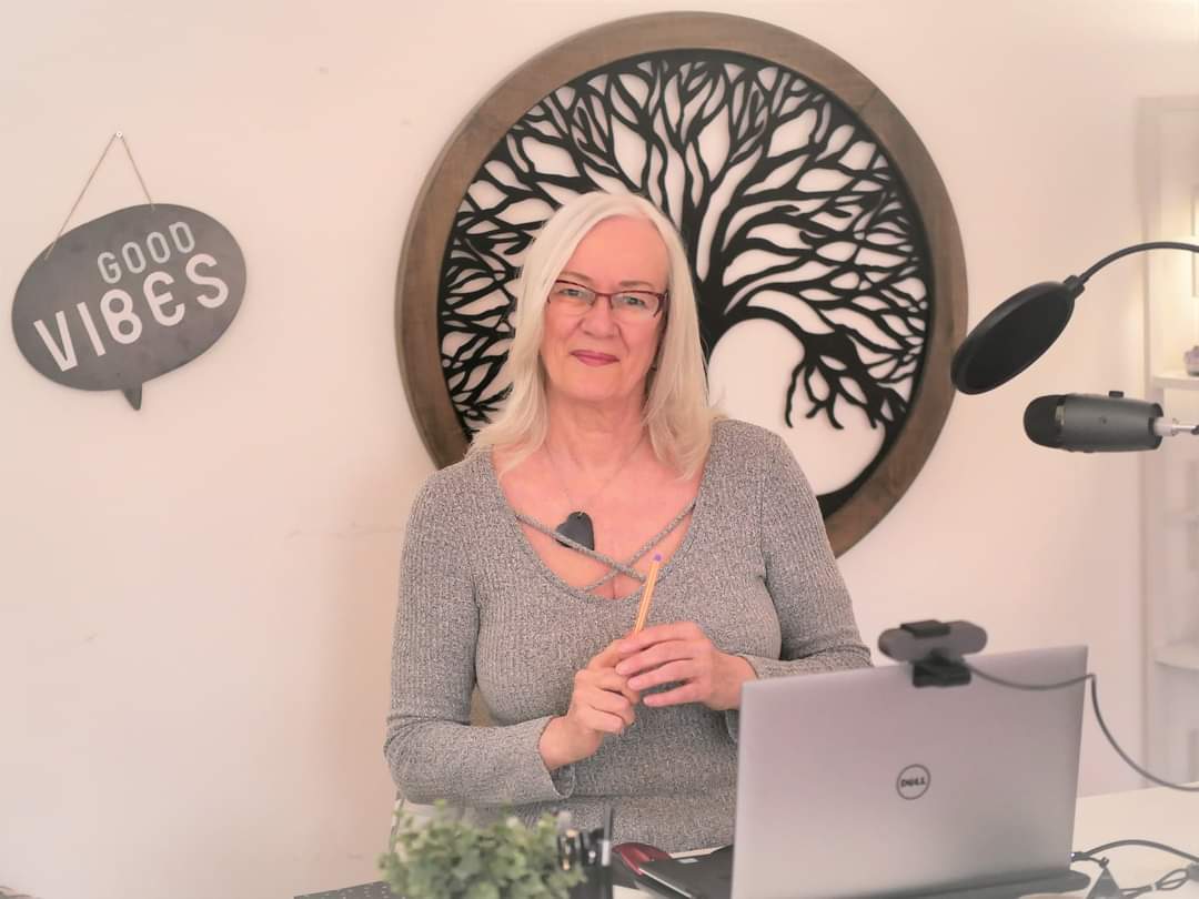 Judy K. Martene at her desk, ready for a live Zoom session